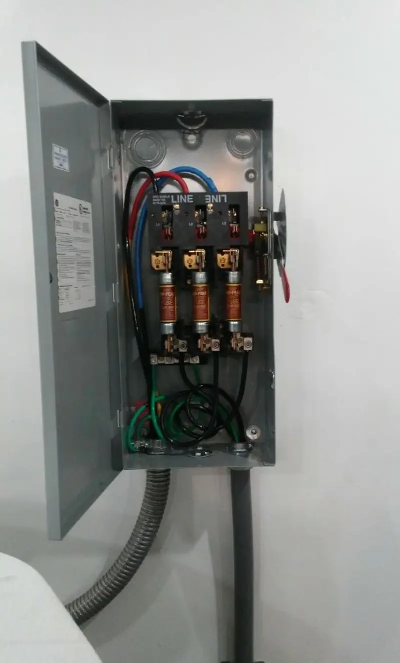 Three-phase disconnect switch installed for Smoke Detector Installation in Iosco
